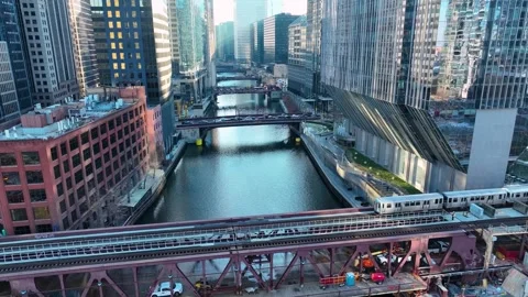 Drone Flying Between Downtown Chicago River Skyscrapers, Sunny Day in Loop 4K Stock Footage 327820571