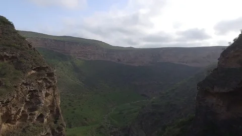 A Drone flying between mountains Stock Footage 114170520