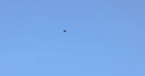 Drone flying in the blue sky. Copy space Video stock 246125095