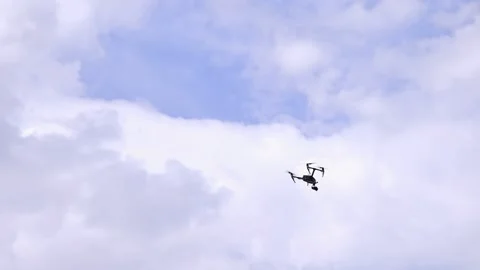 Drone Flying In Blue Sky With White Clouds Stock Footage 333576215