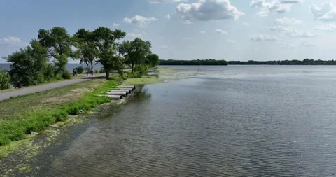 Drone flying by breakwater peninsula park Video stock 246718481