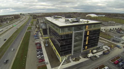 Drone flying by building under construction Stock Footage 63941335