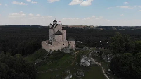 Drone flying circle around medieval castle Bobolice in Poland, 2023 Stock Footage 245749523