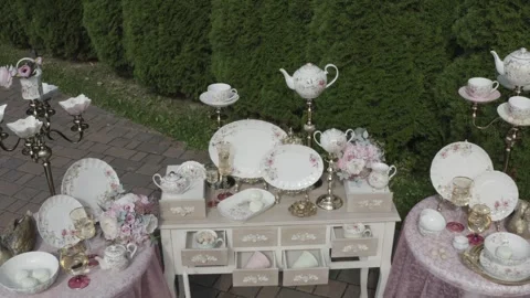 Drone flying up close above decorative porcelain table installation Vidéo 330202557