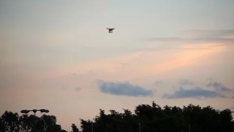 Drone flying up distance at evenign sky Stock Footage 104556628