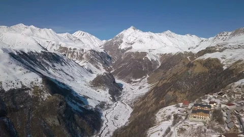 A drone flying to distant mountain peaks in the Caucasus in Georgia Stock Footage 126670425