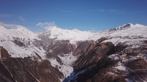 A drone flying to distant mountain peaks in the Caucasus in Georgia Stock Footage 126670467
