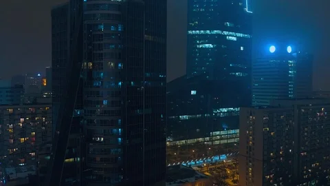 The drone is flying down the glazed skyscrapers. Stock Footage 108584700