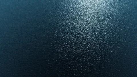 Drone flying down into the ocean 스톡 동영상 73585348