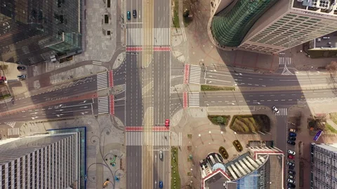Drone flying down over cross roads od Jana Pawla and Grzybowska street in Warsaw Stock Footage 127608627