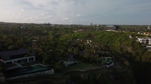 Drone flying down from top of the cliff to the beach. Stock Footage 160885969