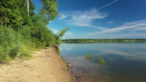 Drone flying down toward river shore Stock-Footage 320122072