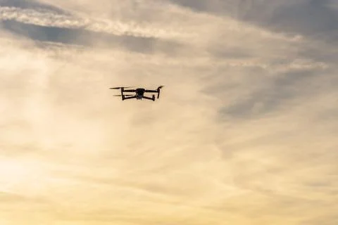 Drone flying at dusk. Stock Photos