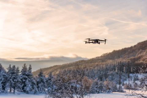 Drone flying at dusk. Stock Photos