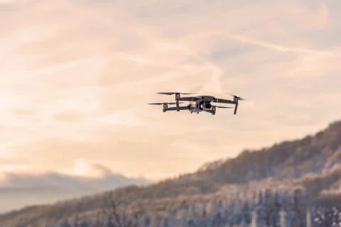 Drone flying at dusk. Stock Photos