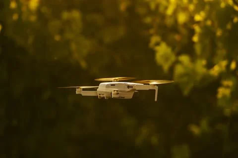 Drone flying at dusk Stock Photos