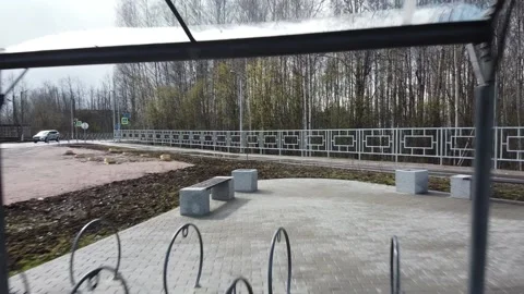 Drone Flying from an Empty Bike Path through a Bicycle Parking Lot Stock Footage 134280929