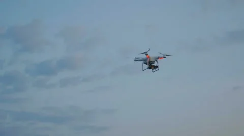 Drone flying in the evening sky with clouds Stock Footage 64814255