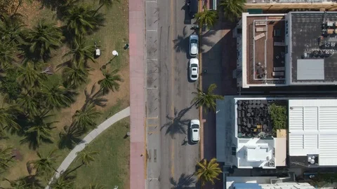Drone Flying Face Down Over Ocean Drive During Covid 19 Lockdown Stock Footage 127064947