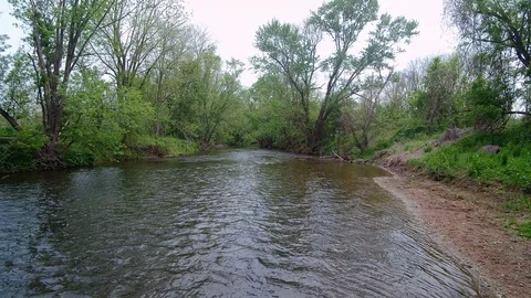 Drone Flying Fast Over River 4k Video stock 126875909