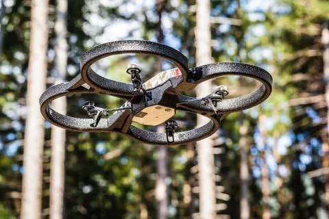 Drone flying in the forest Stock Photos