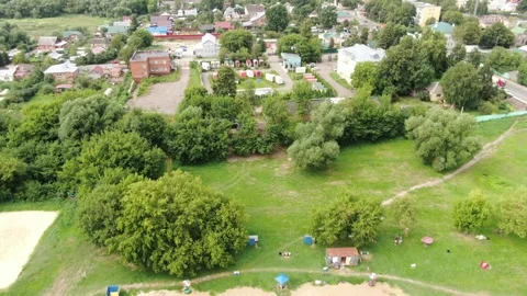 Drone flying forward above Kolomna camping area Stockbeeldmateriaal 333951807