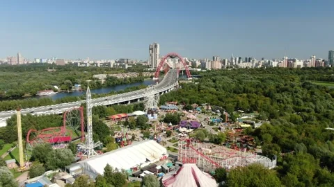 Drone flying forward above park and bridge Stock-Footage 322528685