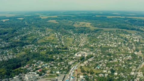 Drone flying forward above private houses in a small town Novgorod Seversky,  Stock Footage 158091329