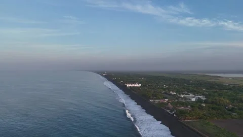 Drone Flying Forward Along Pacific Ocean Coastline at Sunrise Video stock 337915058