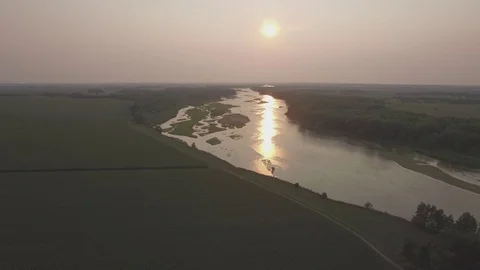 Drone Flying Forward And Descending Over Cornfield To River Raw Stock Footage 78883565