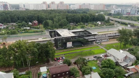 Drone flying forward and tilting down over station Stock-Footage 333539173