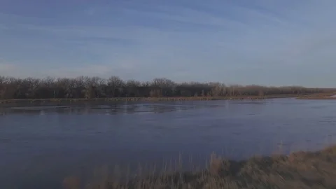 Drone Flying Forward From Field To River Raw Stock Footage 78882885
