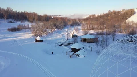 Drone flying forward low above snowy landscape Vidéo 322641689