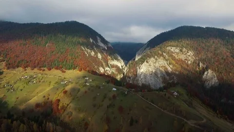 Drone flying forward to a mountain valley in autumn. 4k aerial shot. Stock Footage 78022697