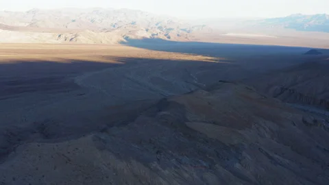 Drone flying forward over a beautiful valley in Devil's Middle Basin Stock Footage 165449903