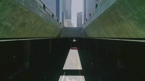 Drone Flying Forward Over Black Vehicle In City - Los Angeles, California Video stock 160719255