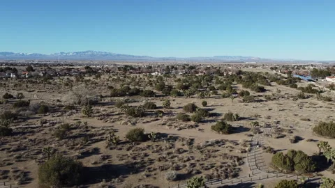 Drone Flying Forward Over Desert Terrain in Lancaster California Stockbeeldmateriaal 335736159