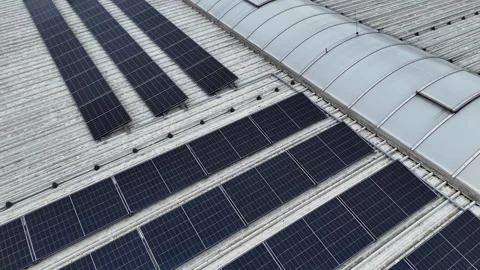 Drone Flying Forward Over Modern Solar Panels Installed On Industrial Roof Stock Footage 330750352