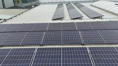 Drone Flying Forward Over Modern Solar Panels On Flat Industrial Roof Stock Footage 330750386