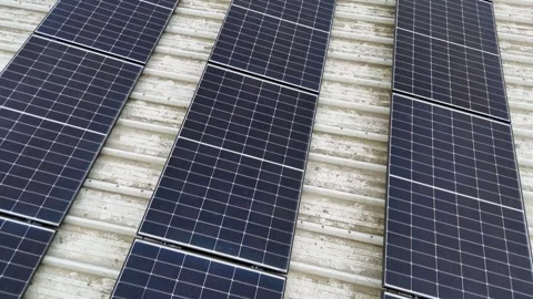 Drone Flying Forward Over Modern Solar Panels On Corrugated Metal Roof Stock Footage 330750397