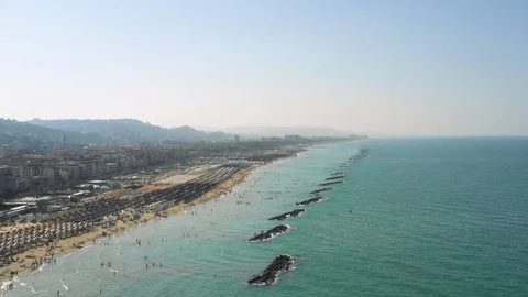 Drone Flying Forward Over Ocean With Rock Formations Close To Italian Shore Stock Footage 120029414
