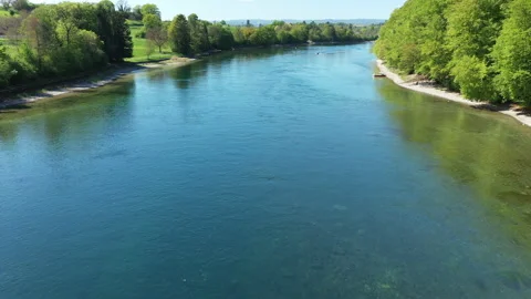 Drone flying forward over Rhine river with green landscape, aerial travel view Video stock 333529319