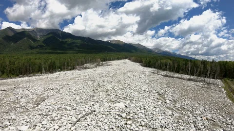 Drone flying forward over the river of stones Stock Footage 97022985