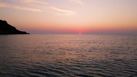 Drone Flying Forward Over Sea Water Towards Scenic Sunrise Sunset Stock Footage 340620454