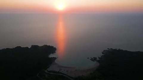 Drone Flying Forward Over Silistar Beach Bay at Golden Sunrise Sunset Stock Footage 340621037