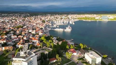 Drone flying forward, parallel to a small croatian city. Stock Footage 297469579