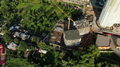 Drone flying forward tilting down over Ryazan construction Stock Footage 329921508