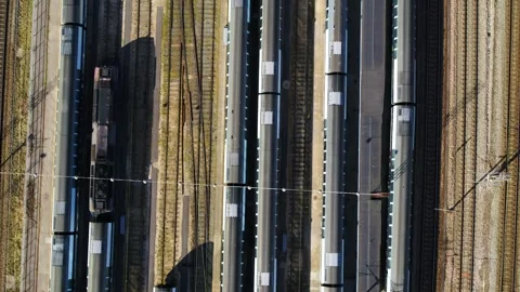 Drone flying forwards over rows of stagnant trains Stock Footage 269673788
