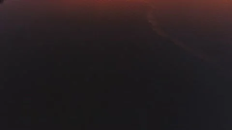 Drone Flying Forwards with Tilt Towards Sunset in Miami Beach 4k Stock Footage 68955778