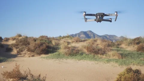 Drone flying in front of the camera Видео 98749464